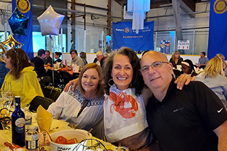 Photo of people enjoying their meal at Rotary Club Lobsterfest event